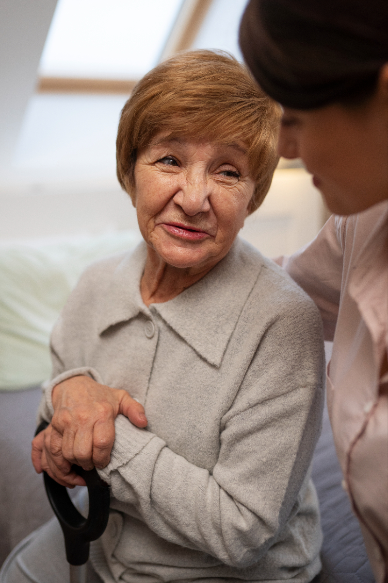 female-nurse-taking-care-elderly-person